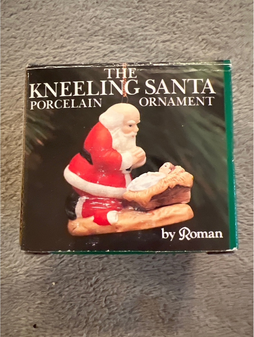 The Kneeling Santa Porcelain Ornament by Roman